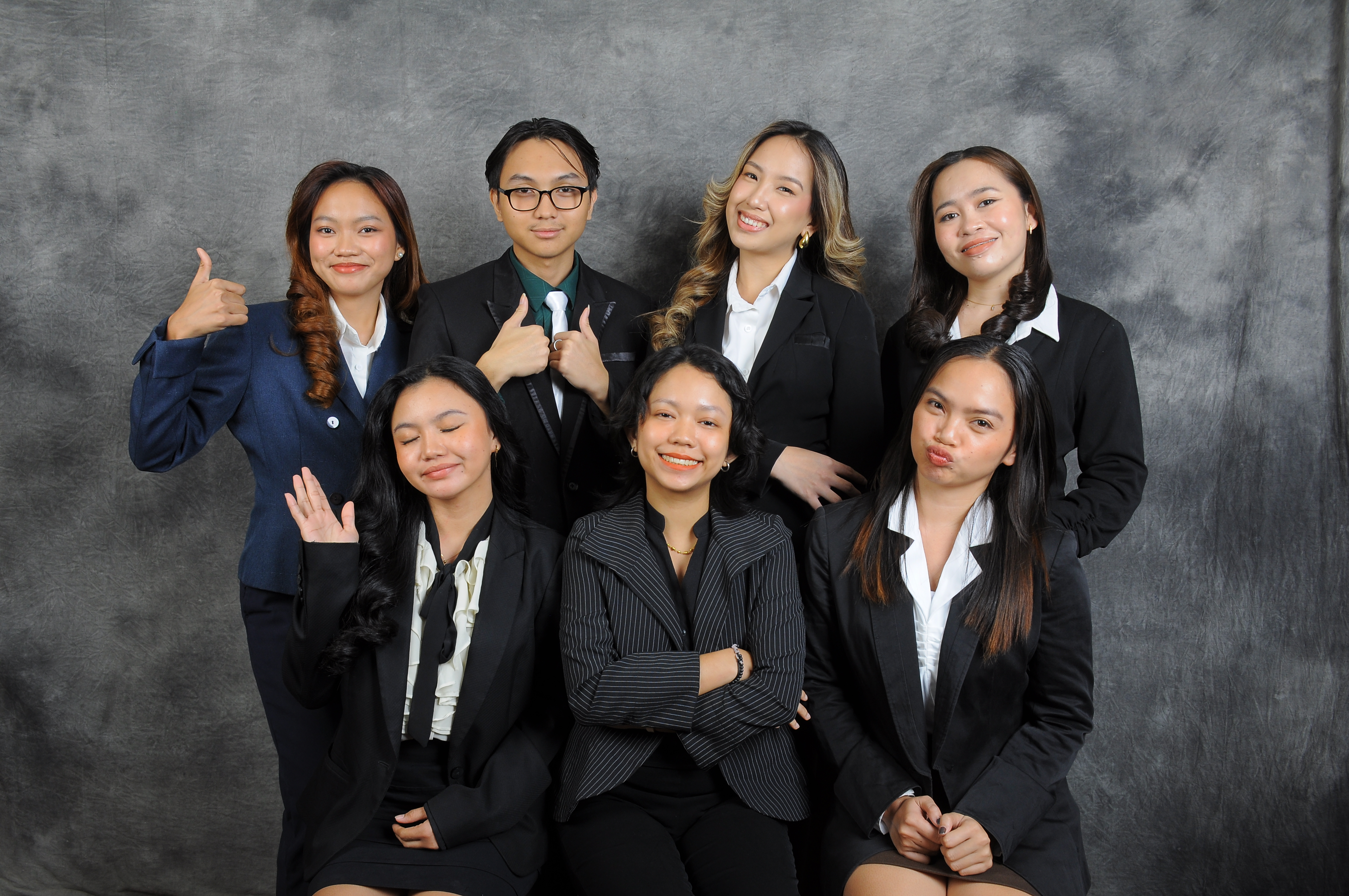 MB&A CPAs team members giving a thumbs up
